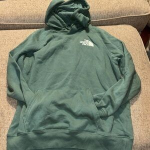 Never worn Brand new North face hoodie in a green color
